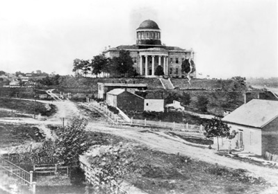 Historic photo of the first capitol bulding in Jefferson City