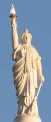 Miss Freedom statue on dome