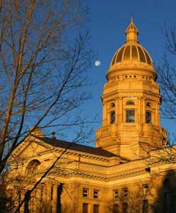 Wyoming capitol and moon at sunset